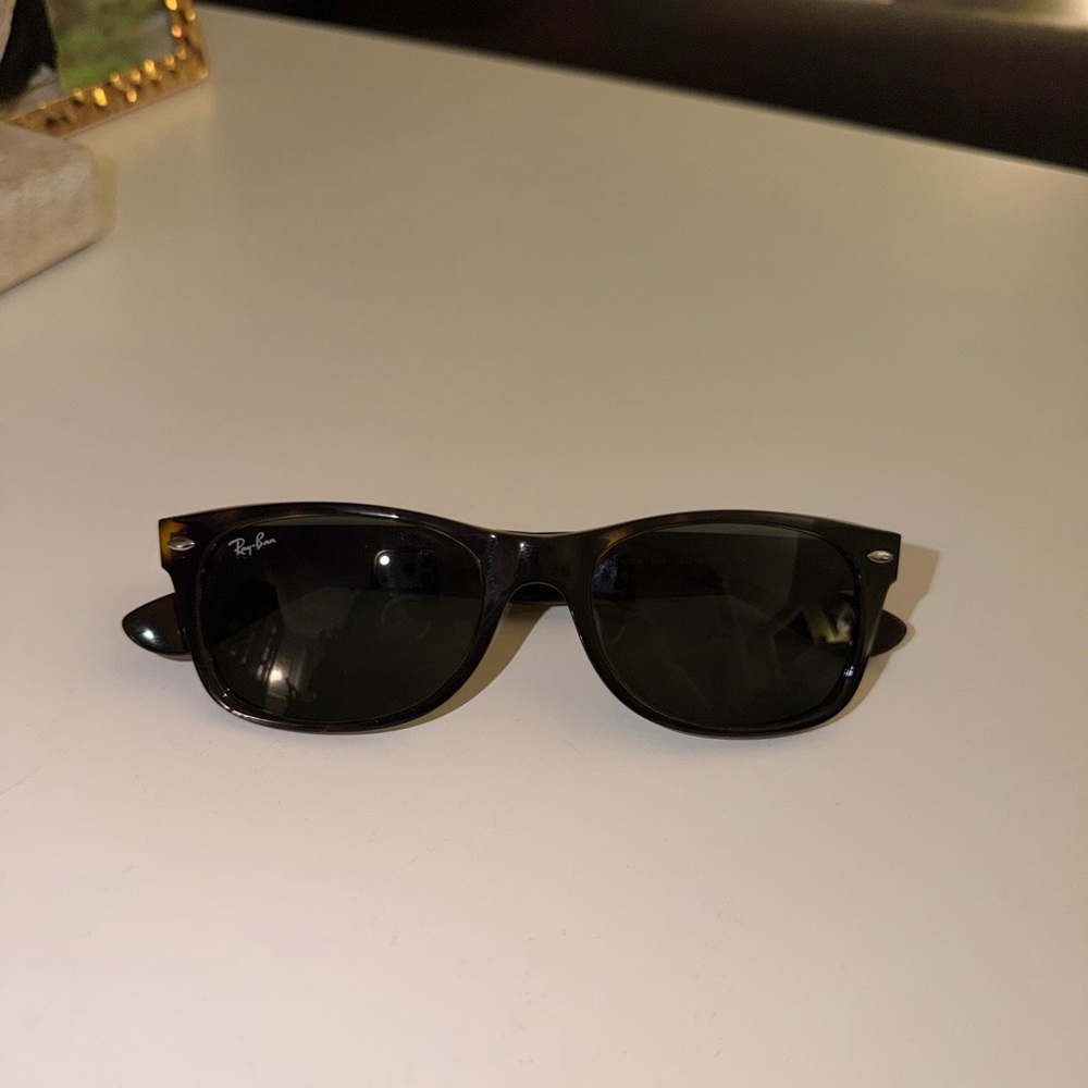 Ray-Ban Women’s New Wayfarer RayBan sunglasses.
